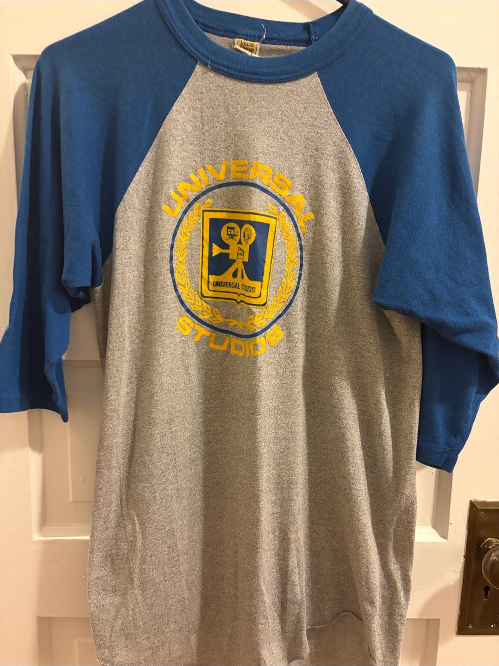 Velva Sheen VINTAGE Universal Studios Grey & Blue Raglan Tee with Yellow Crest